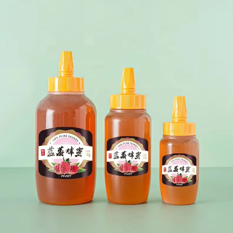 Hot filling PP 250g 500g 1000g empty honey bottle  plastic squeeze bottle for honey sauce packaging with Pointed cap