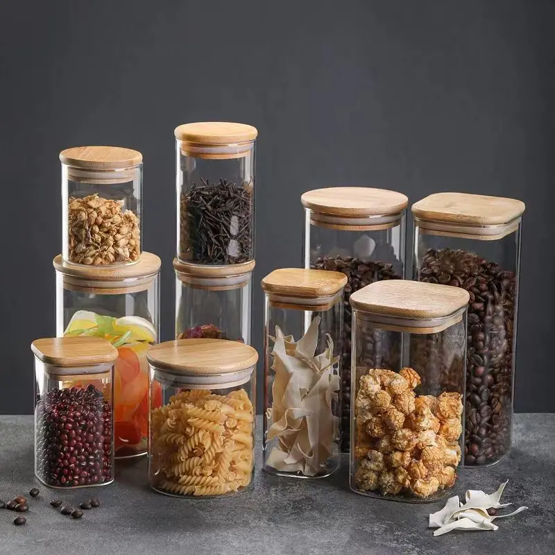 hot sell heat resistant high borosilicate kitchen containers cylinder glass sealed food cereal storage jar with bamboo lid