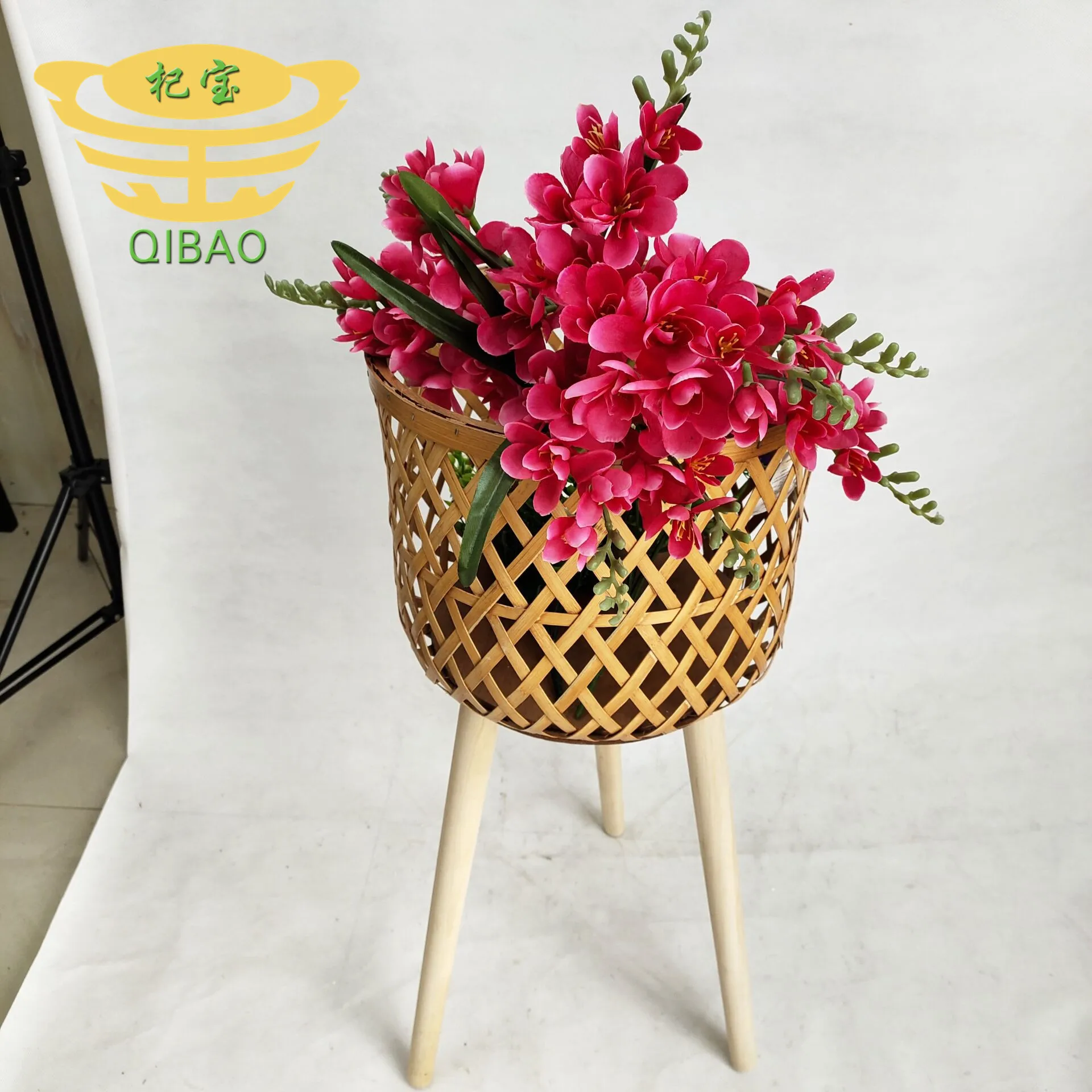 Wholesale fashion hand woven flowerpot PE rattan flowerpot with independent wooden leg outdoor flower basket