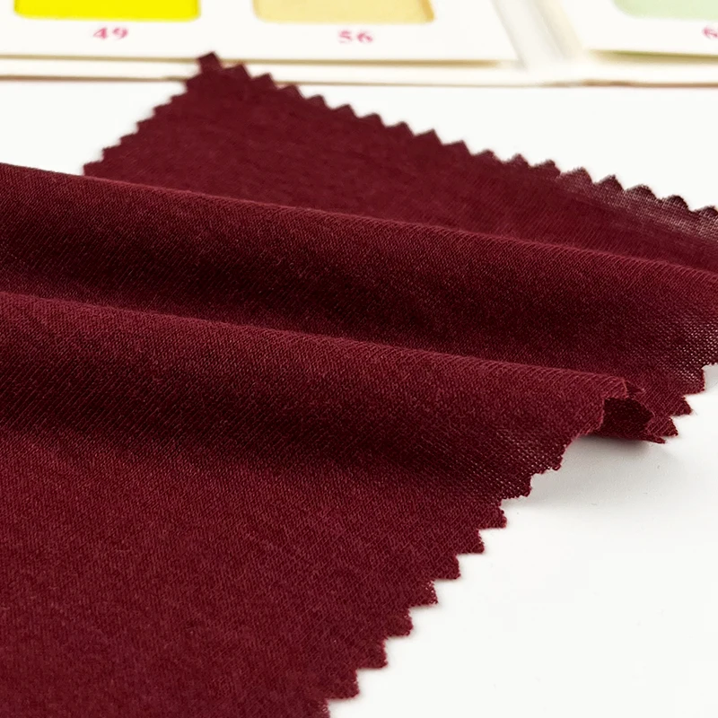 lightweight and breathable 40 cotton CVC plain fabric 110gsm 65%polyester 35% cotton knitted t-shirt fabric