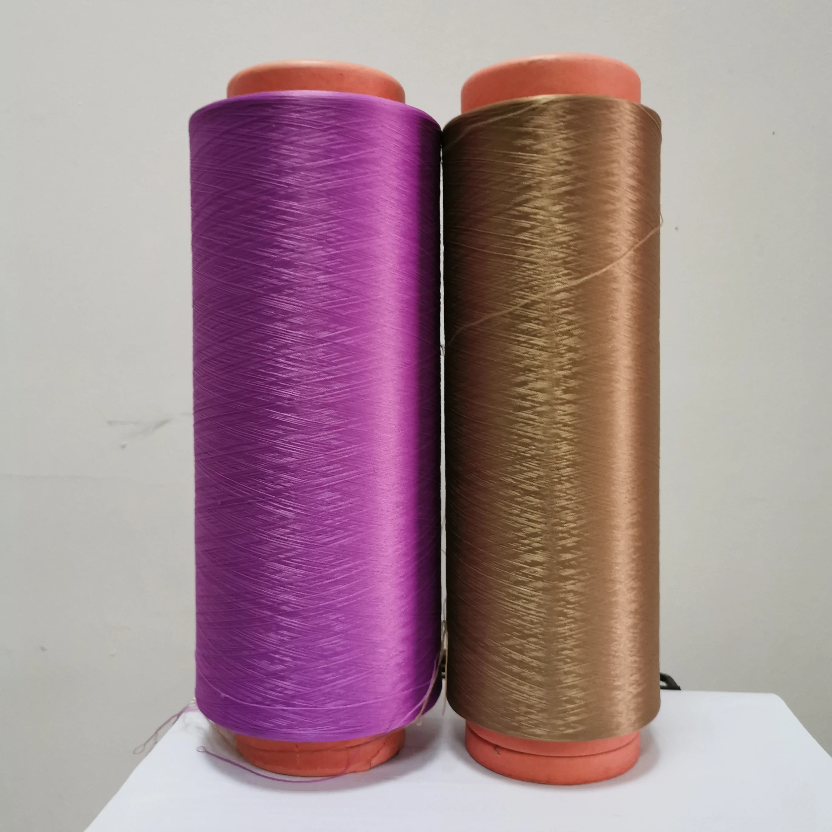 
1000 hours AATCC grade 4 DTY 300D/144F/2 S+Z Cross section super soft bright dope dyed UV resistance polyester yarns 