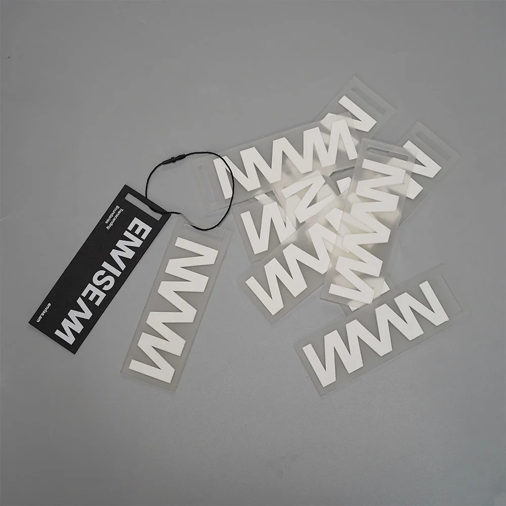 Customized brand logo garment tag 3D embossed silicone patch rubber label black paper hang tag for clothing business
