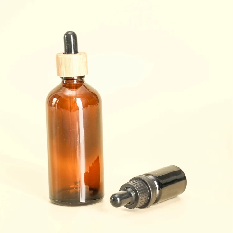 Wholesale 5ml 10ml 15ml 30ml 100ml Cosmetic Amber Essential Oil Serum Glass Pipette Bamboo Dropper Glass Bottle