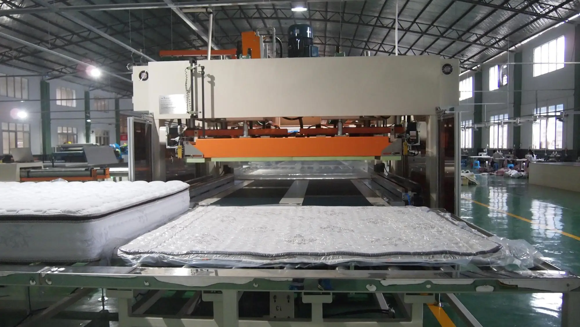 Automatic Mattress Film Covering and Compressing Machine Engineers Available to Service Machinery Overseas Hydraulic