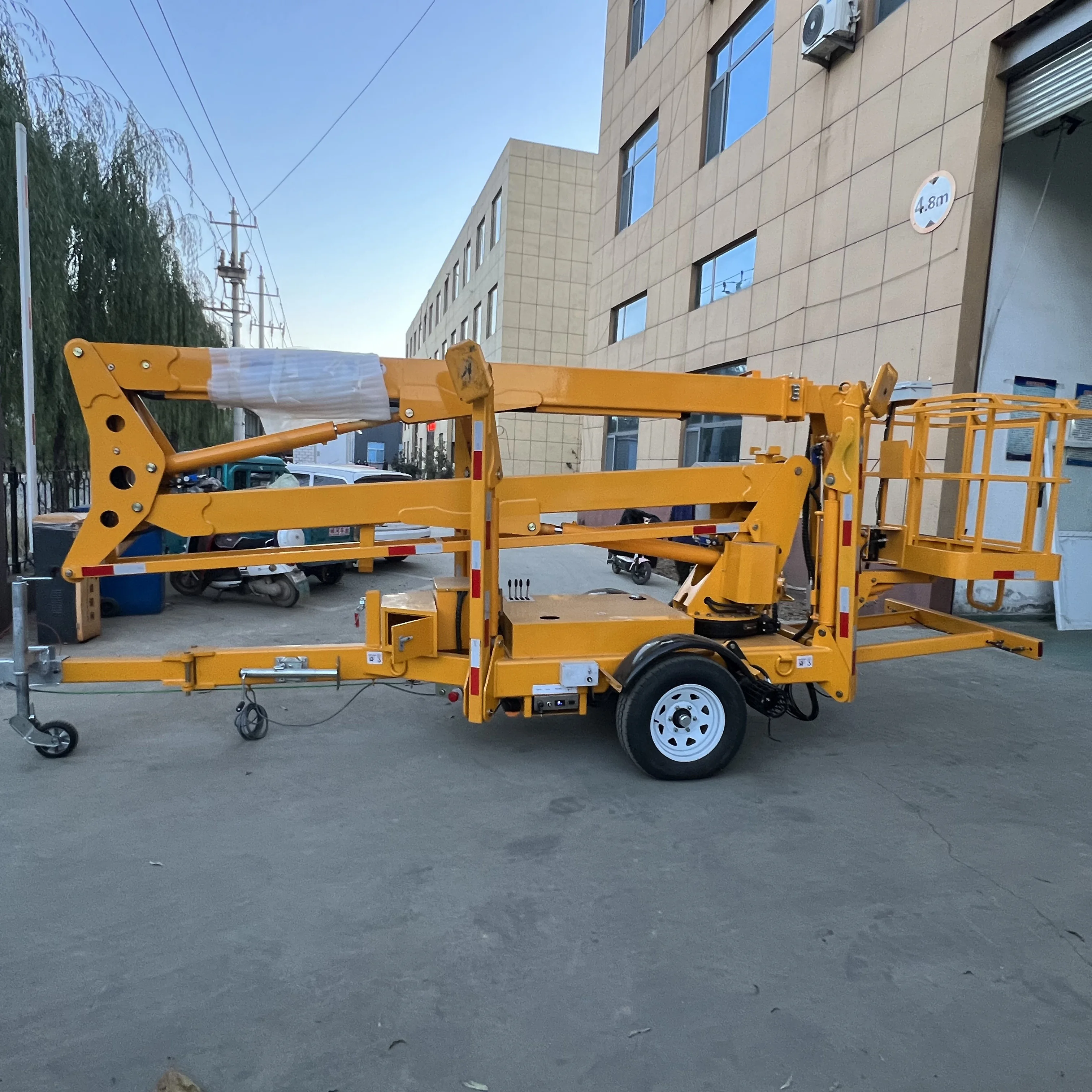 P-128 Aerial work towable articulated telescopic boom lift cherry picker hydraulic lift for sale