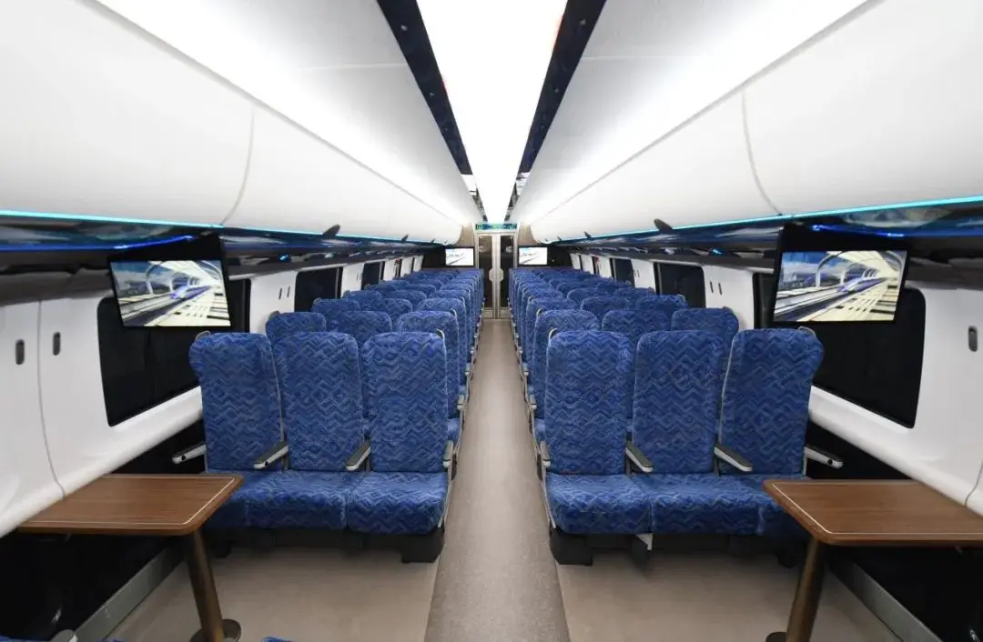 Economic class railway train seats / triple