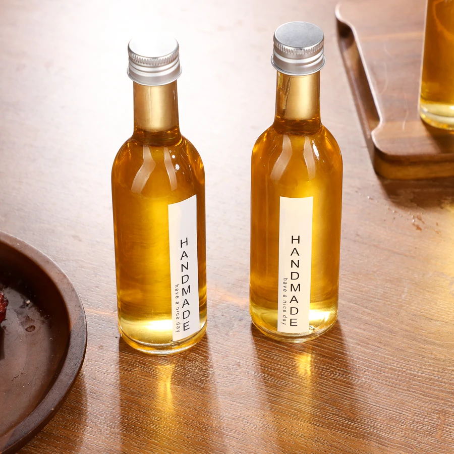 50ml 100ml mini whisky vodka glass wine bottle portable round shoulder clear long neck small spirits bottle with screw cap