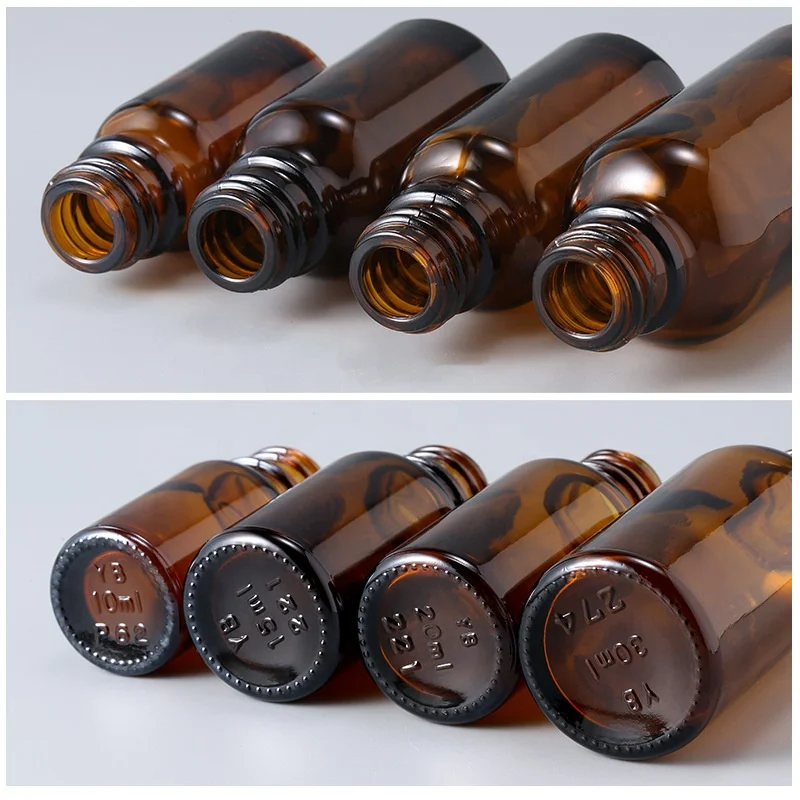 Wholesale amber cosmetic packaging 10ml 15ml round glass essential oil bottle boston glass reagent bottle with caps