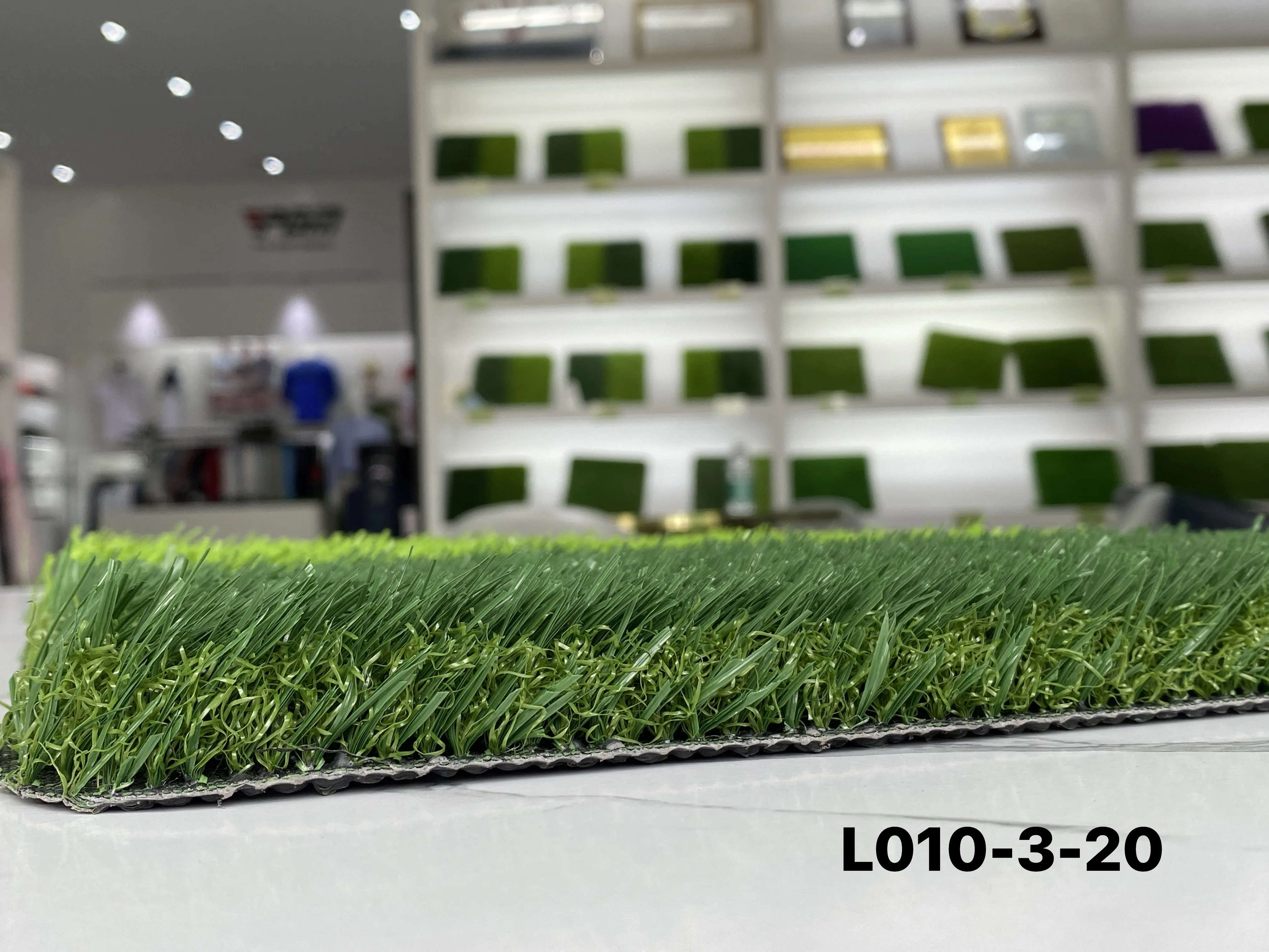 QINGZHOU synthetic mini football turf grass carpet non infill soccer field football carpet artificial grass for rooftop
