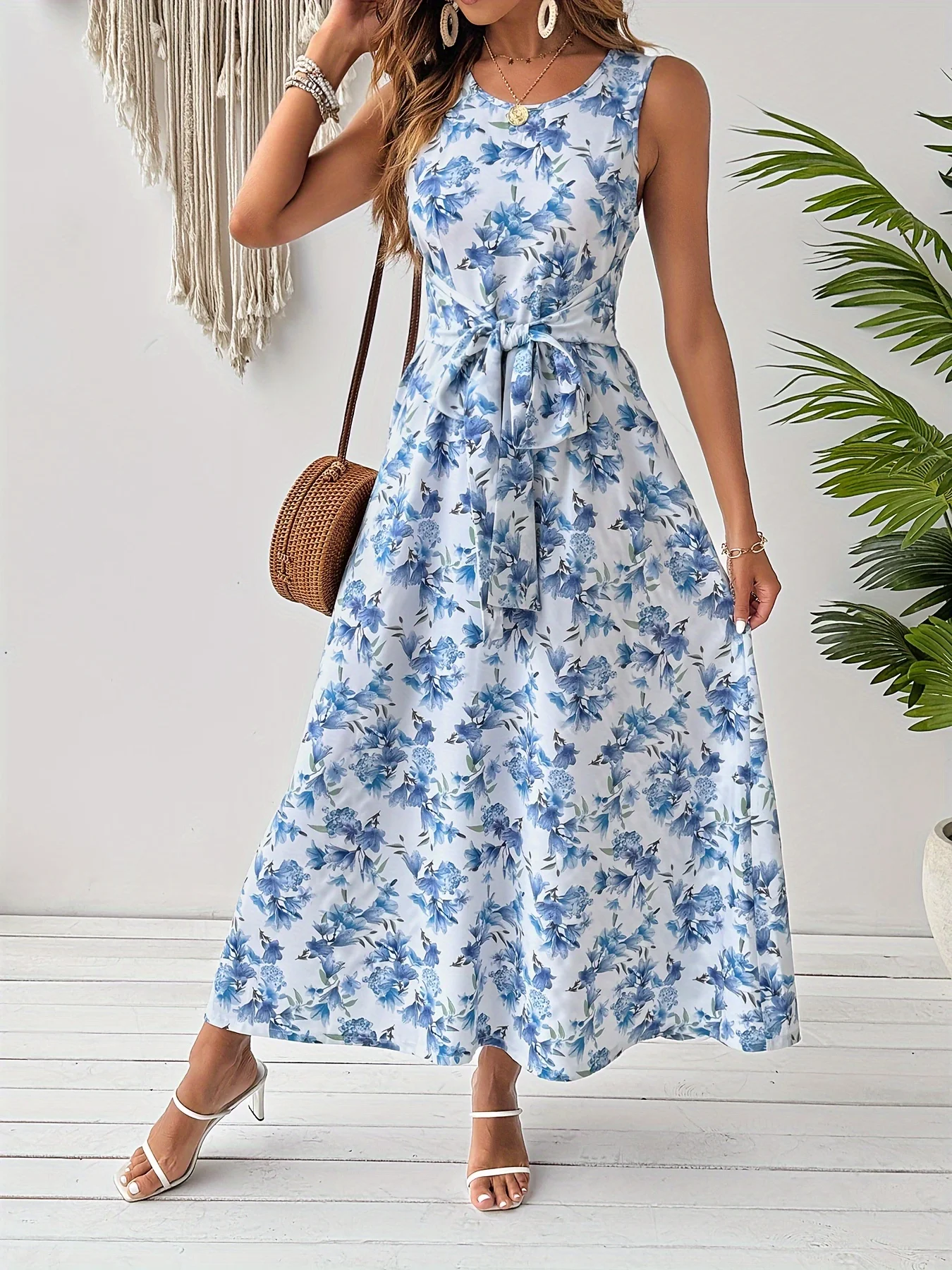 Latest custom dinner dresses for ladies and elegant floral printed midi dress with round neck and sleeveless for women