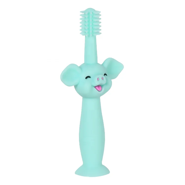 Factory With suction cup grip can be customized baby toothbrush cartoon piggy shape silicone toothbrush baby