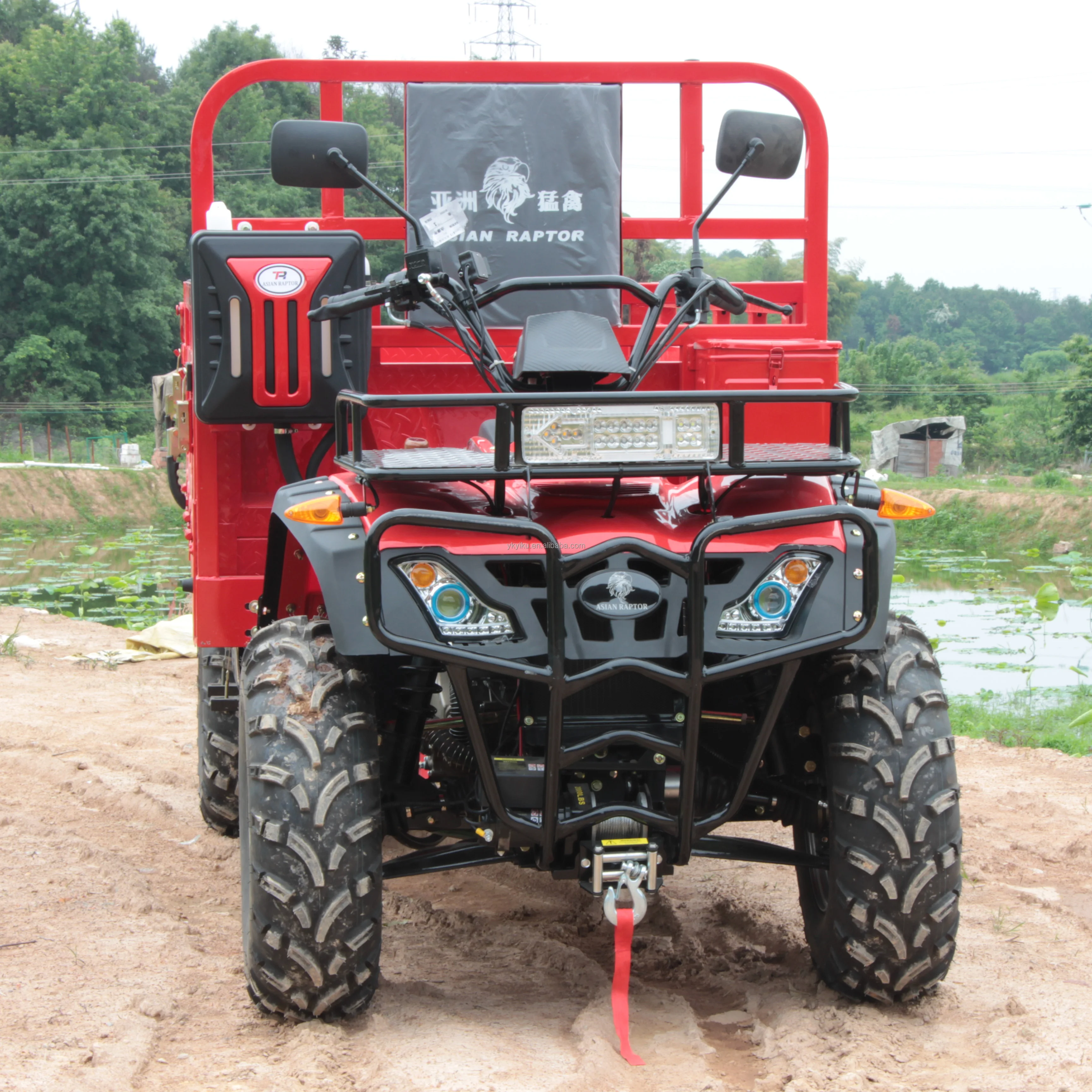 Four-wheeled farmer off-road motorcycle ATV with a bucket and agricultural all-terrain desert farm utility vehicle