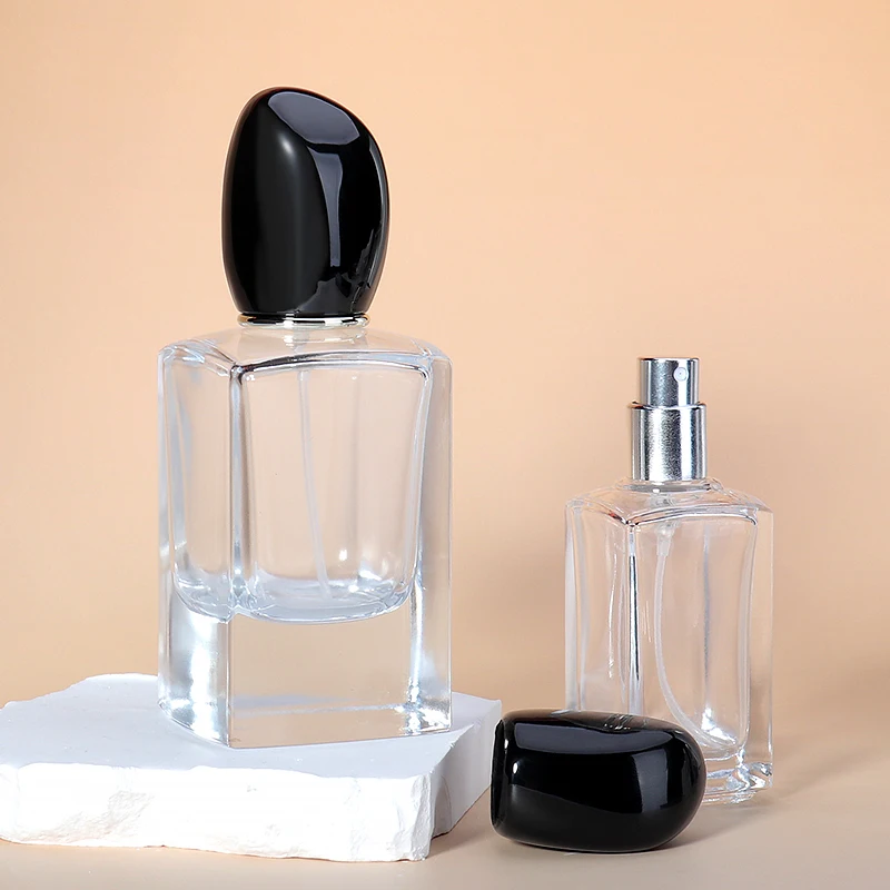 Luxury 100ml Transparent Glass Perfume Bottle Customized Empty with Matte Finish Lids Spray for Cosmetics Fragrance Creation