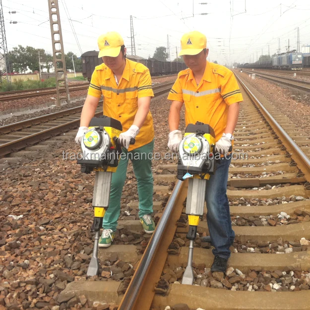 Portable and efficient railway equipment ballast tamping tool with gasoline engine