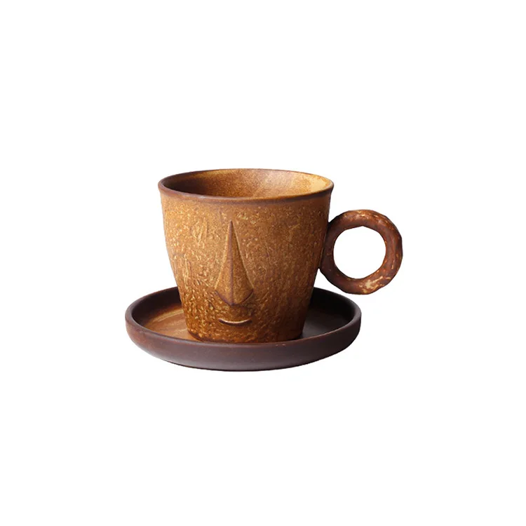 Wholesale Creative Design Ceramic Mask Shaped Cup With Saucer 310ml For The Kitchen