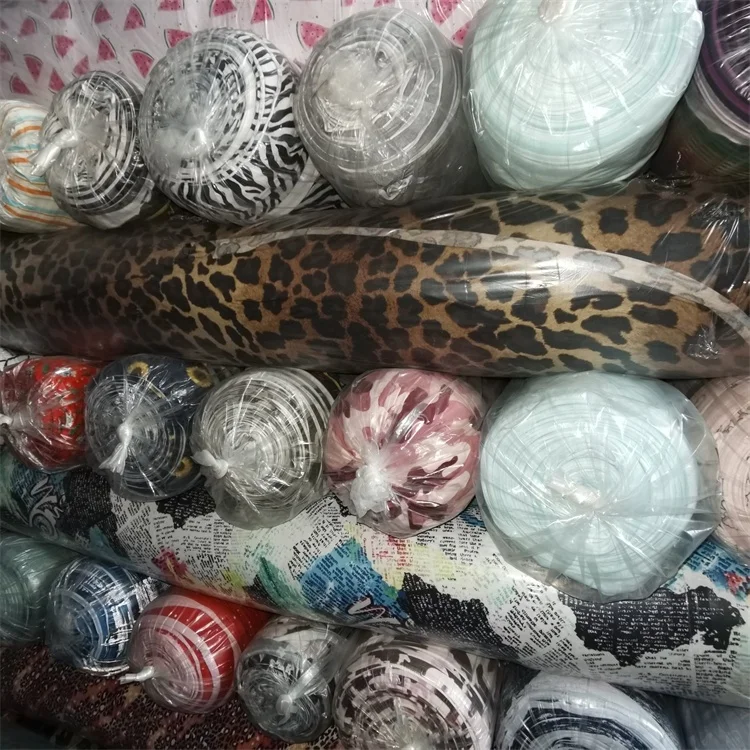 China 140-180 Polyester DTY Brushed Four Way Stretch Knit Printed Stock Fabric For Garment