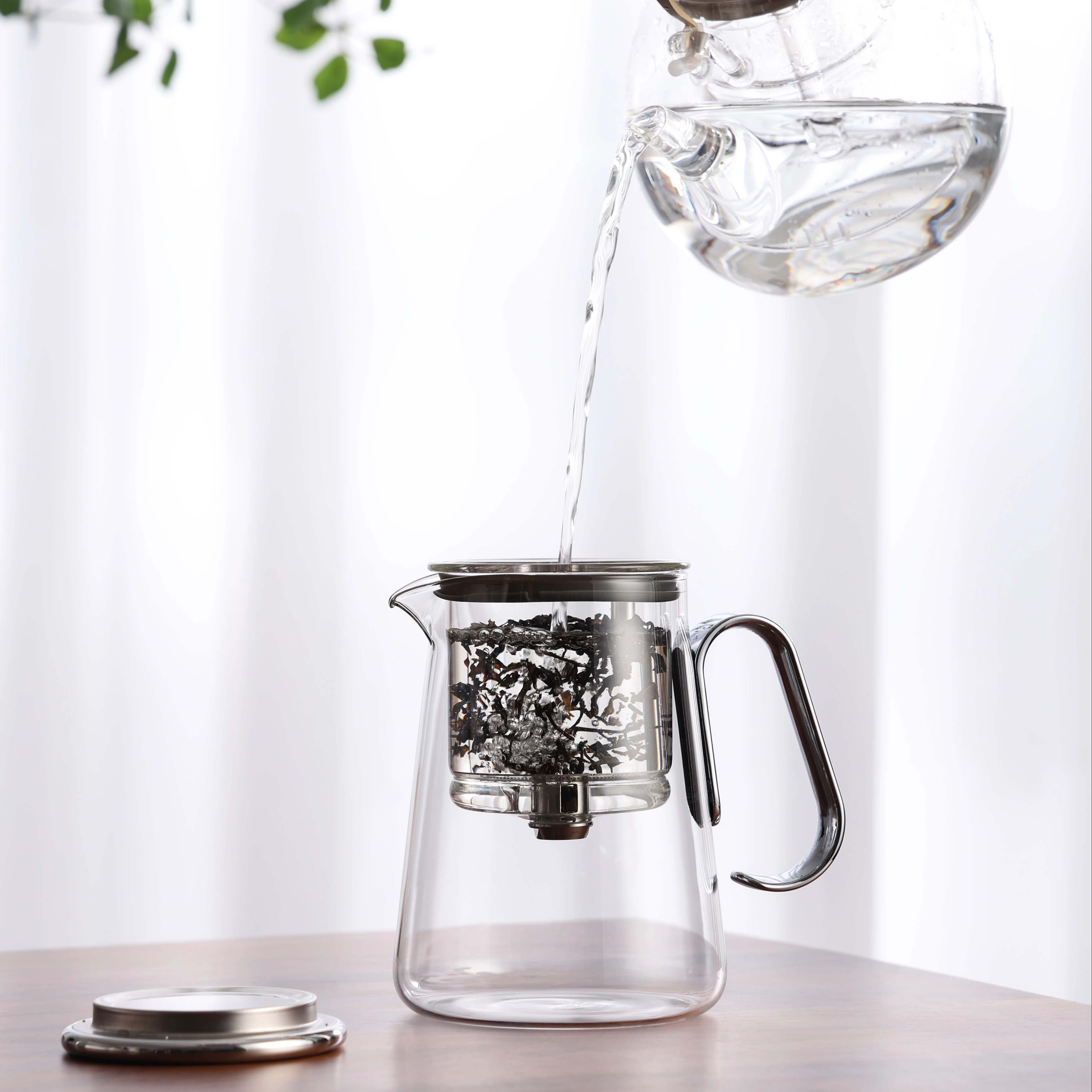 Hot Sale Custom Healthy Drink 700ml Chinese Heat Resistant Glass Kettle Magnetic Rotating Tea Pot Set With Handle Filter