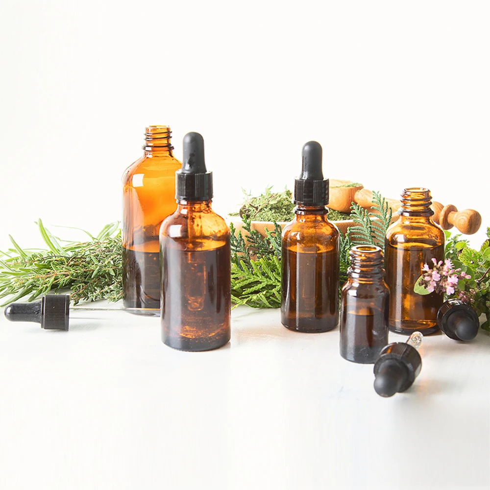 High-quality glass dropper bottle with plastic collar for cosmetic applications