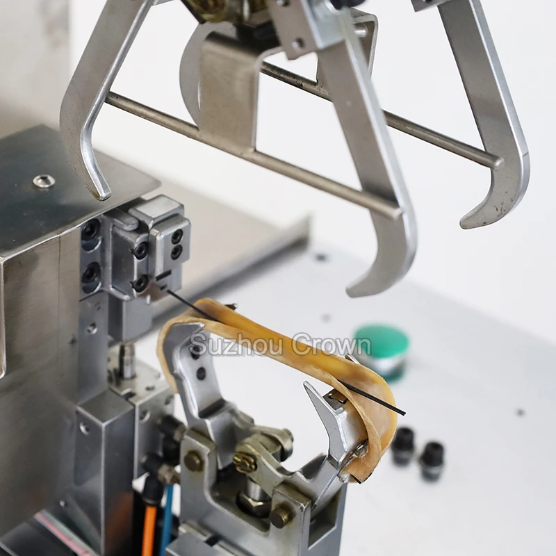 AC power cord coiling and bundling machine