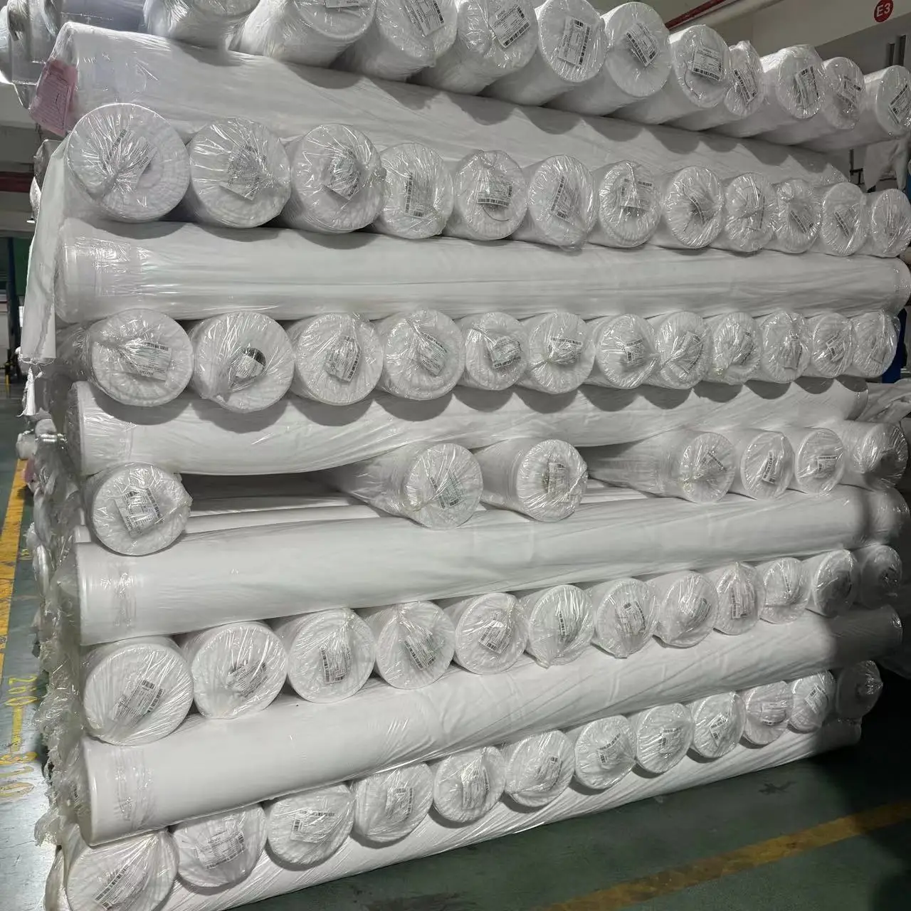 Wholesale solid 100% polyester dyed plain woven microfiber fabric roll packing