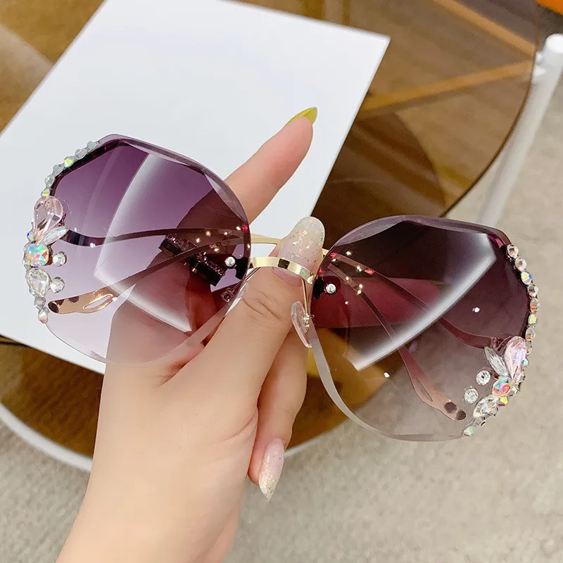 Wholesale hot selling fashion bling diamond sunglasses women UV400 lentes de sol oversized rimless sunglasses large metal frame