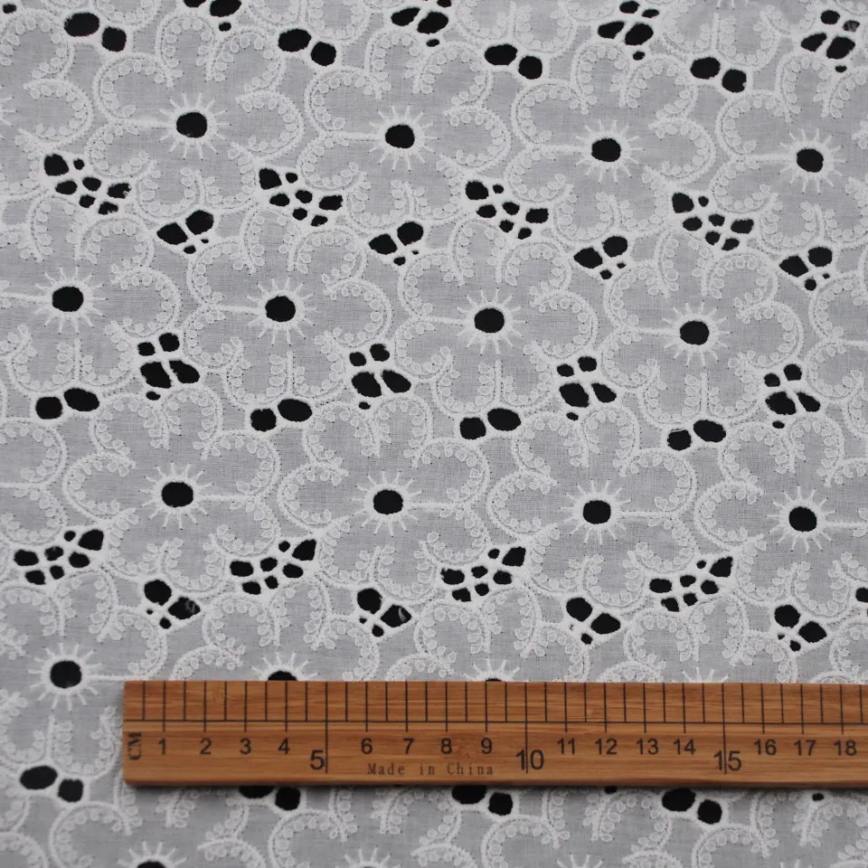 China cheap wholesale price european white tulle pure cotton luxury hollow embroidery lace fabric