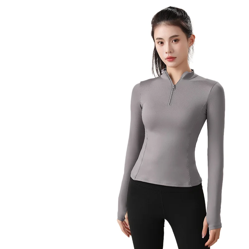 A newly produced semi zippered yoga top with quick drying and slimming function in 2024  which is breathable and sporty