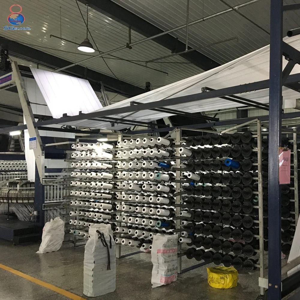 White plastic agricultural nursery mulch weed barrier ground cover