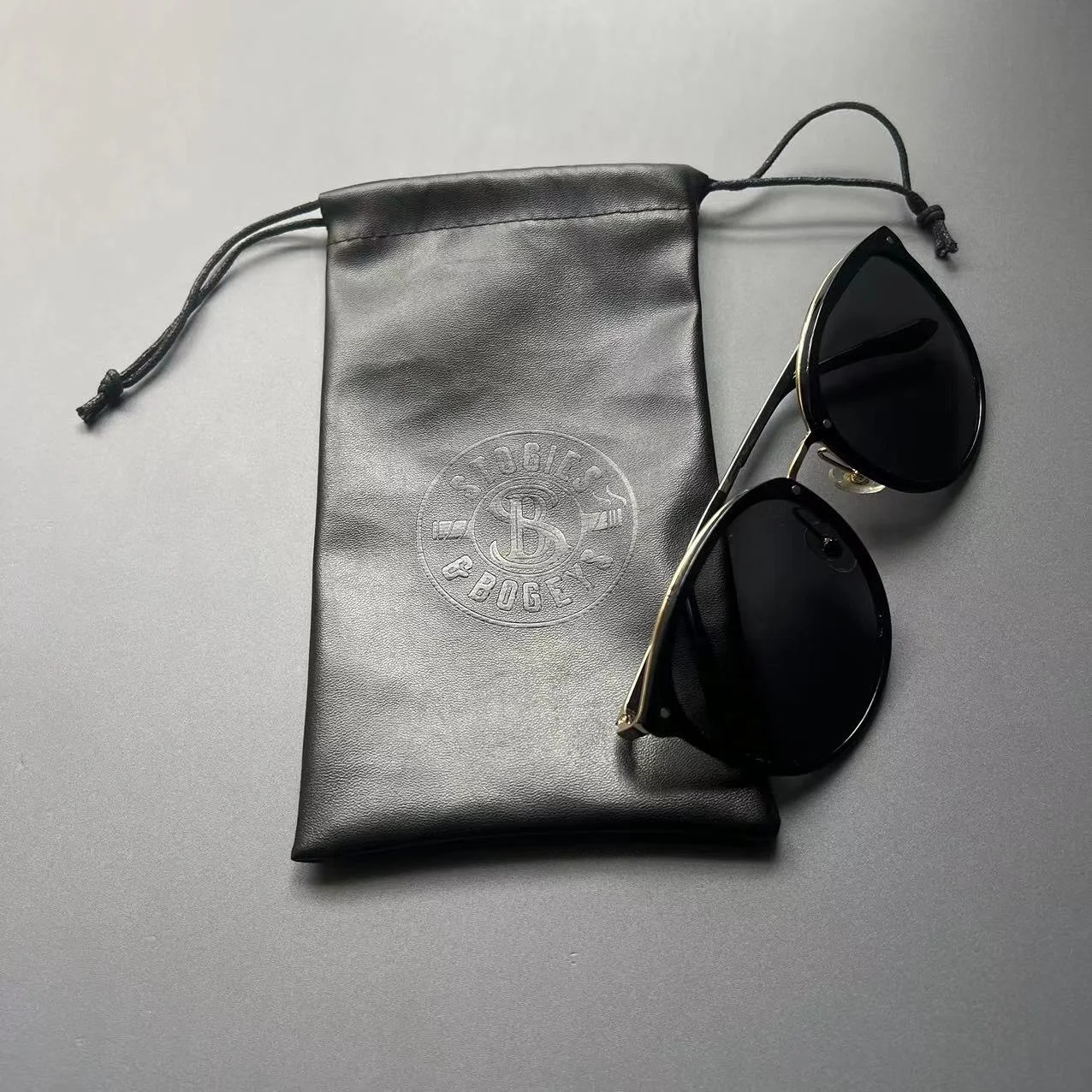 High Quality Black PU Leather Drawstring Sunglasses Eyeglasses Soft Bag with Custom Embossed Logo