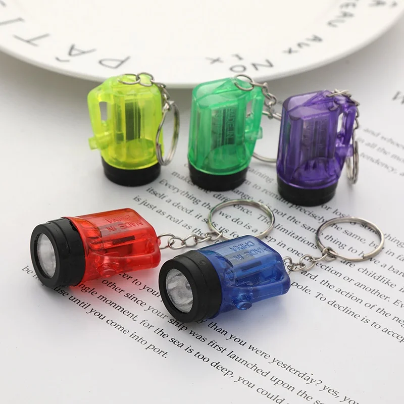 Hot sell Small LED mini key chain novelty flashlight Mini flashlight keychain