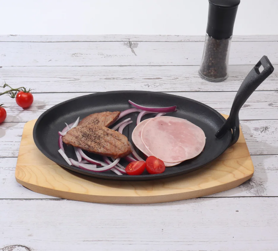 Hot Sale Oval Shape Cast Iron Sizzling Pan Flat Bottom Steak Fish Frying Pan Fajita Plate Skillet with Wooden Base