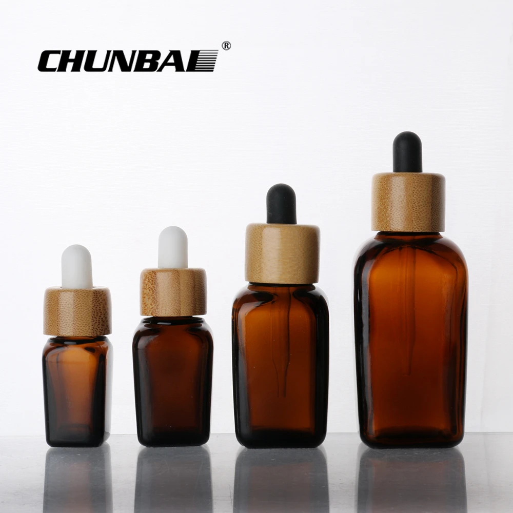 Screen Printing 1oz 2oz 30ml 60ml  matte black amber cosmetic packaging facial essence glass dropper bottle with bamboo cap