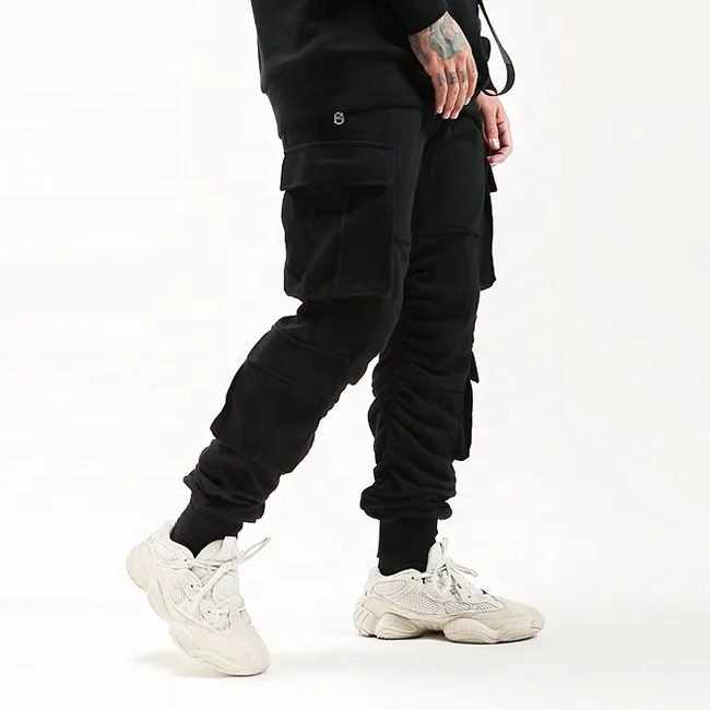 Stock usa street multi pockets zipper solid color pants elastic drawstring casual jogger pants mens popular sweatpants wholesale