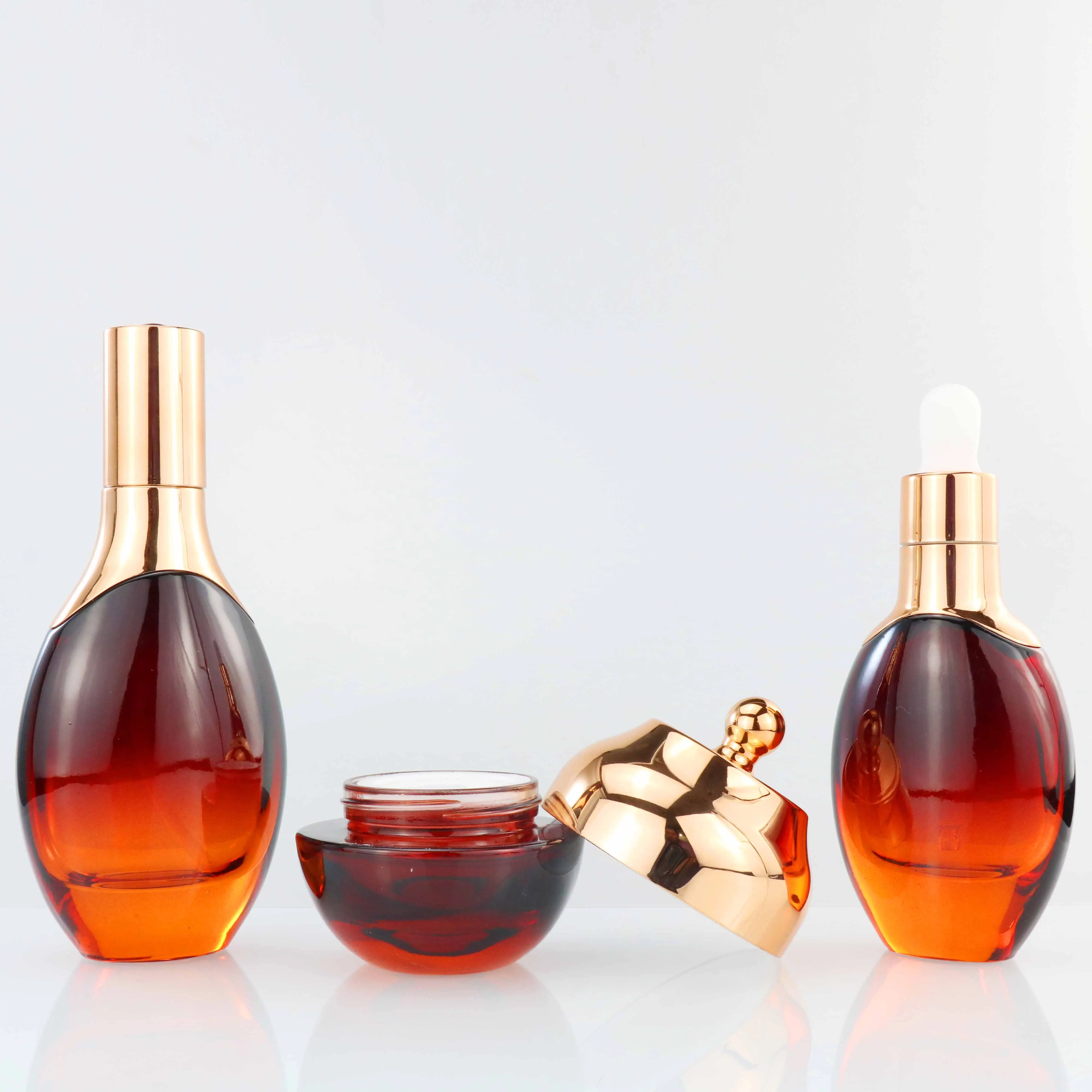 Luxury Red Glass Skin Care Packaging Bottle Cosmetic Body Cream Bottle with Dropper for Essential Oil