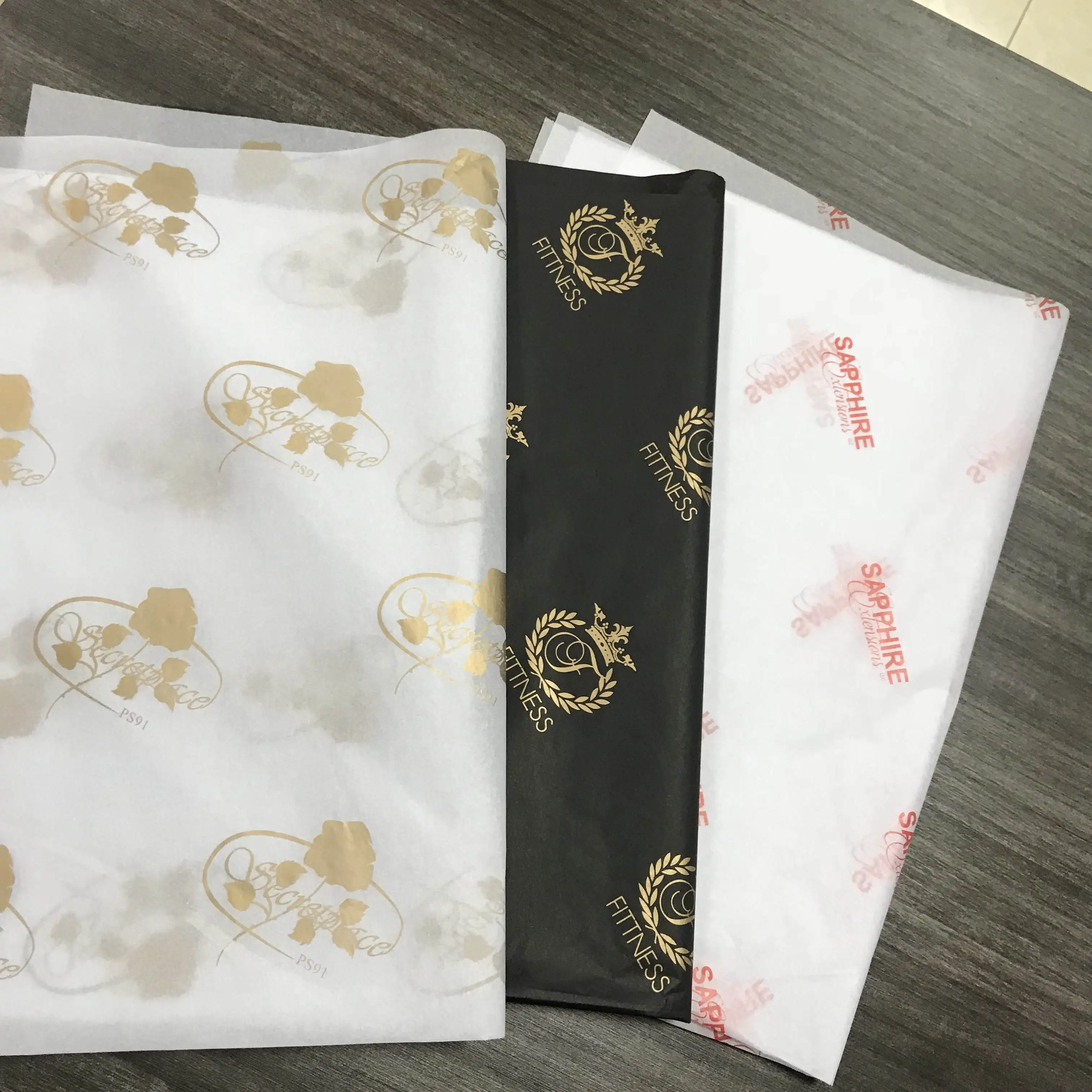 
Custom logo printed greaseproof oil greaseproof wax food wrapping paper chocolate wrapping paper 