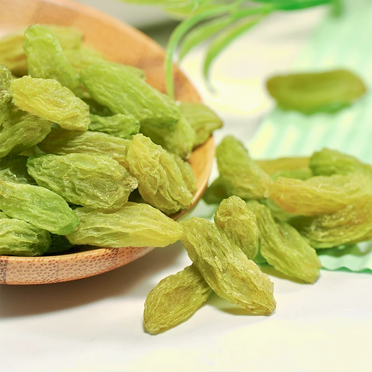 Premium seedless dried grapes Sweet green raisins Natural food product for all ages