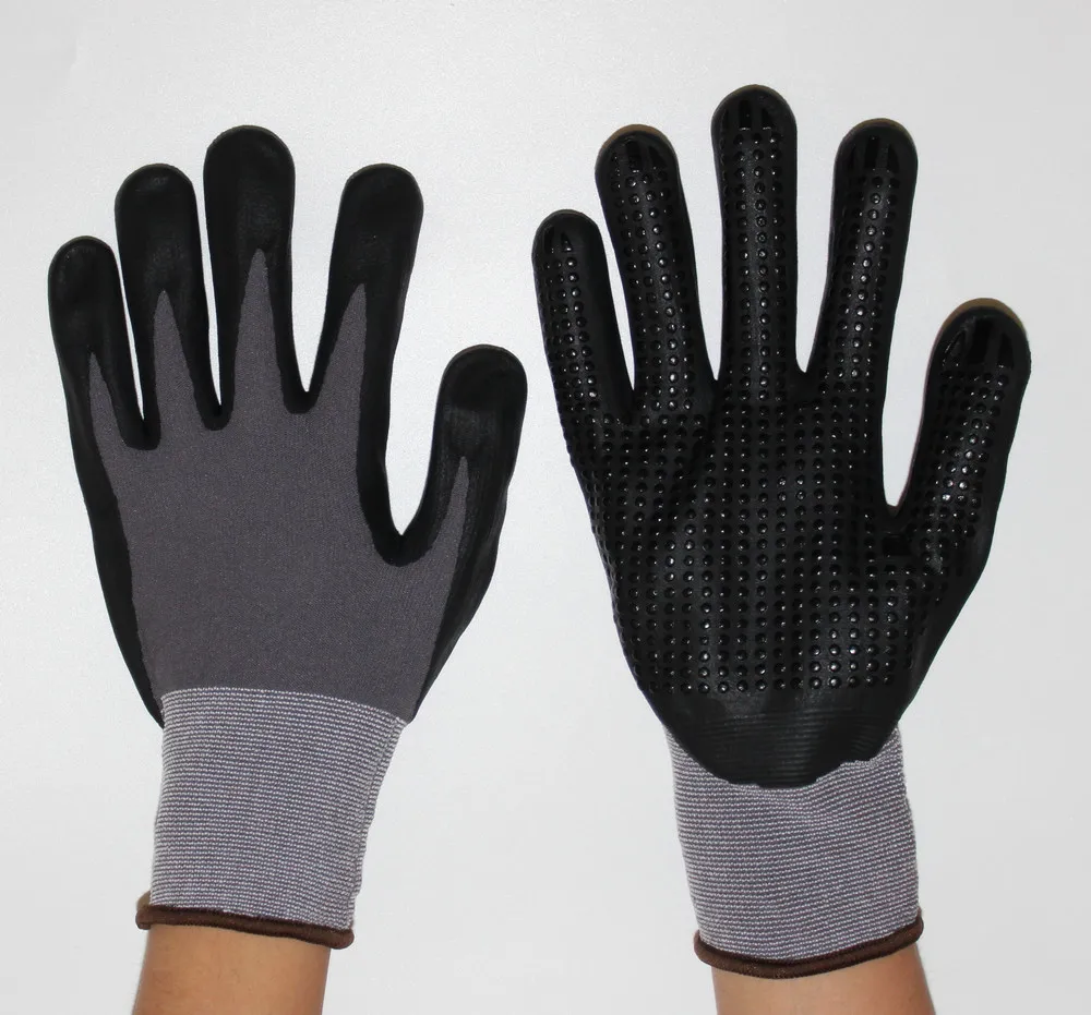SUNCEND hot sale 15 gauge nylon and spandex liner dipped high-tech foam nitrile with PVC dots safety gloves