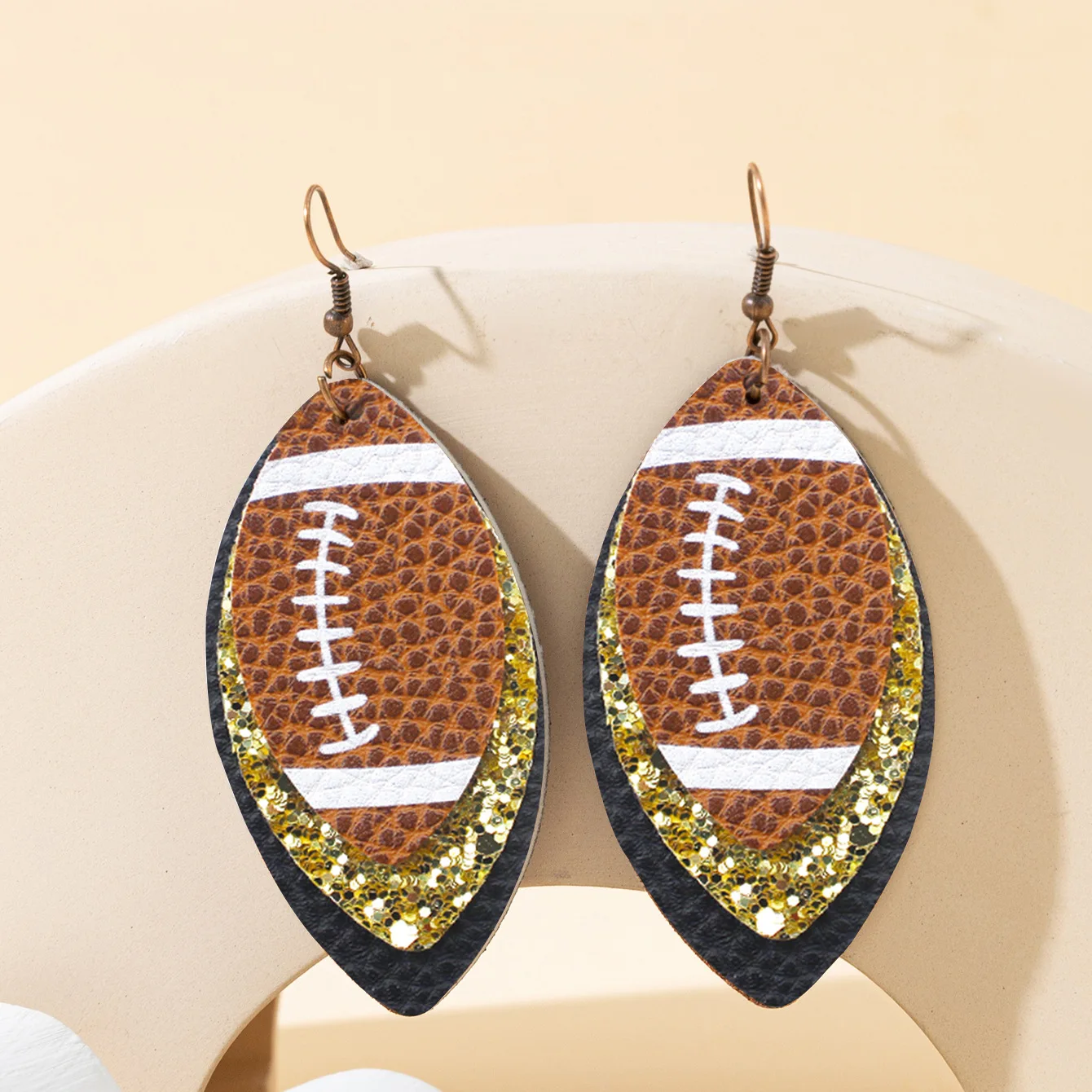 Sporty style rugby brown leopard leaf three-layer leather dot diamond rugby earrings