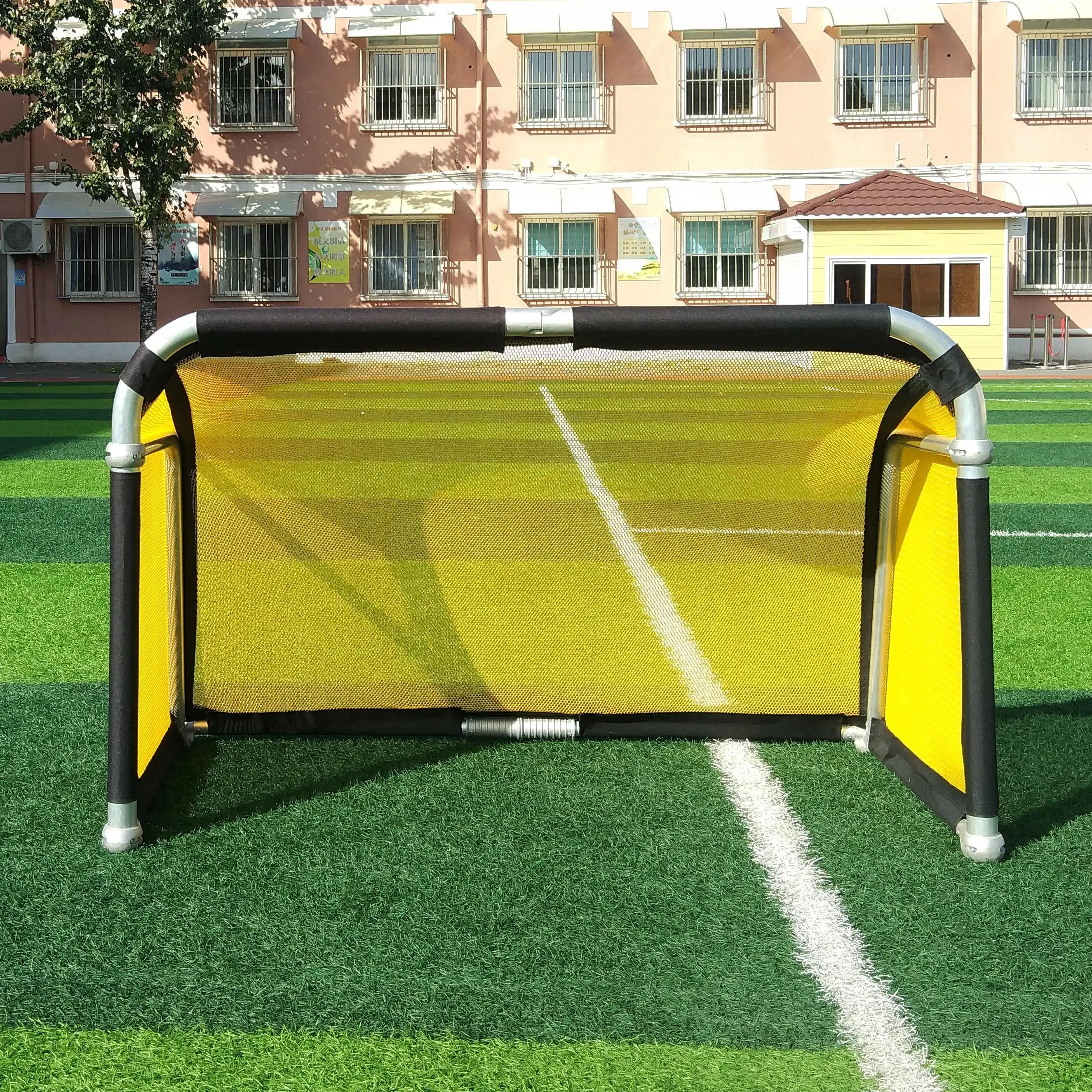 4 ft Kid using foldable  mini aluminum portable soccer goal