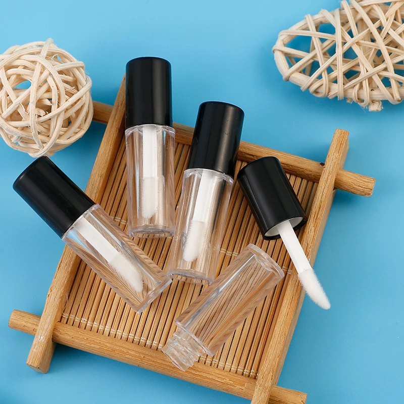 Round matte lip gloss tube transparent clear with black top , empty plastic cosmetic lip gloss tube small custom logo