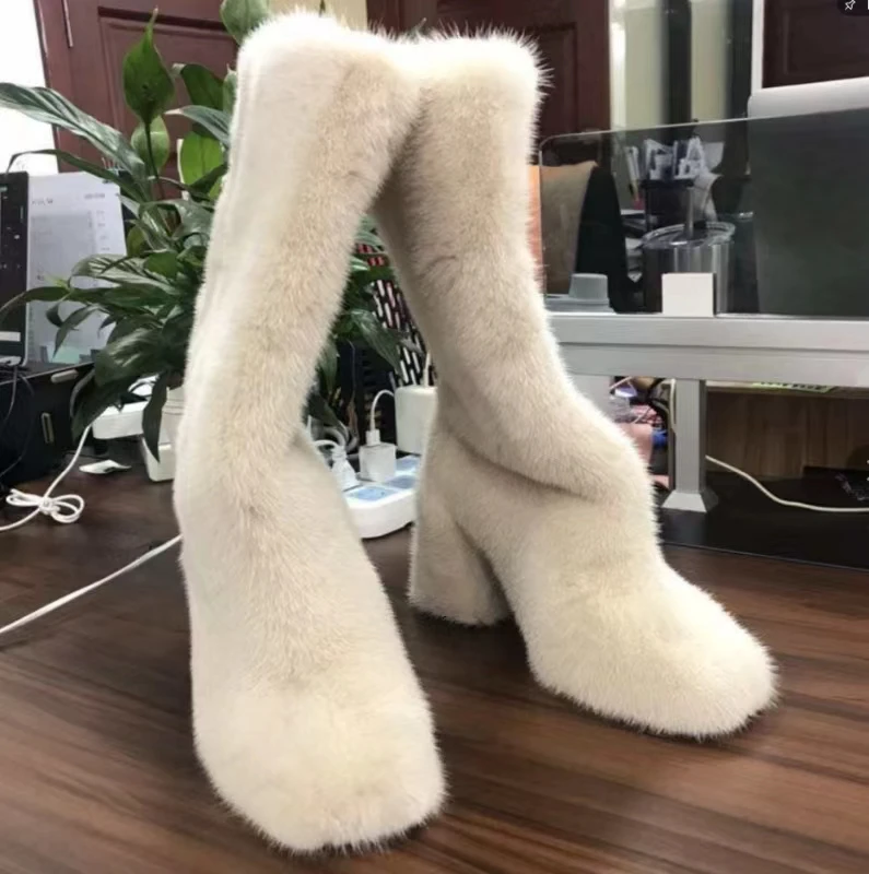 Женские зимние меховые сапоги
