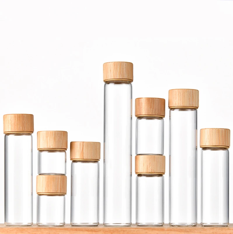 Custom logo Clear screw tubular Mini Tube Food Storage 10ml 15ml 20ml 30ml 50ml 60ml 100ml Glass Vial Bottles With bambooo Cap