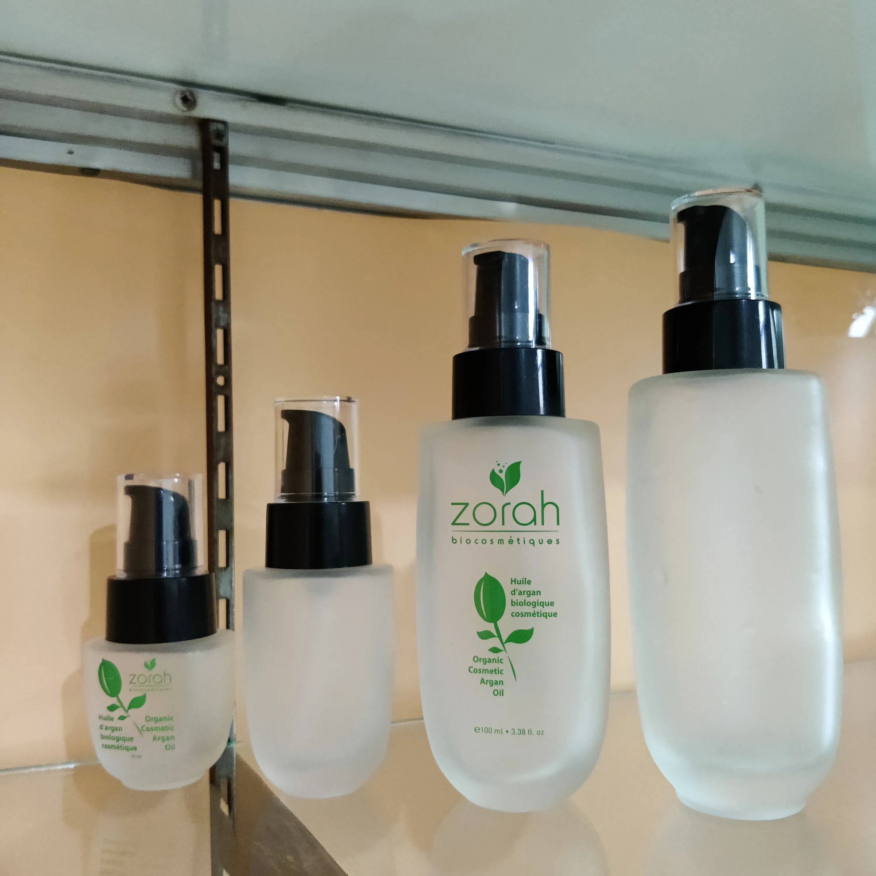 cosmetic packaging 50ml U shape foundation lotion clear flat glass bottle with silver pump