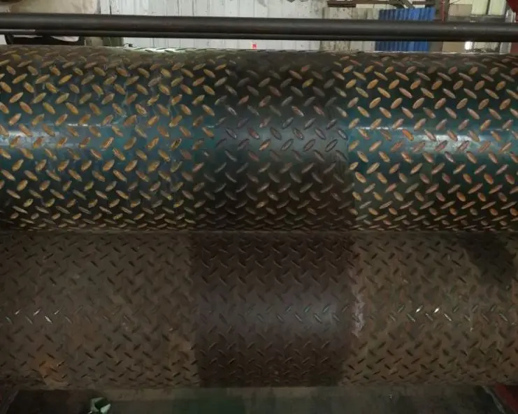 Checker plate embossing machine