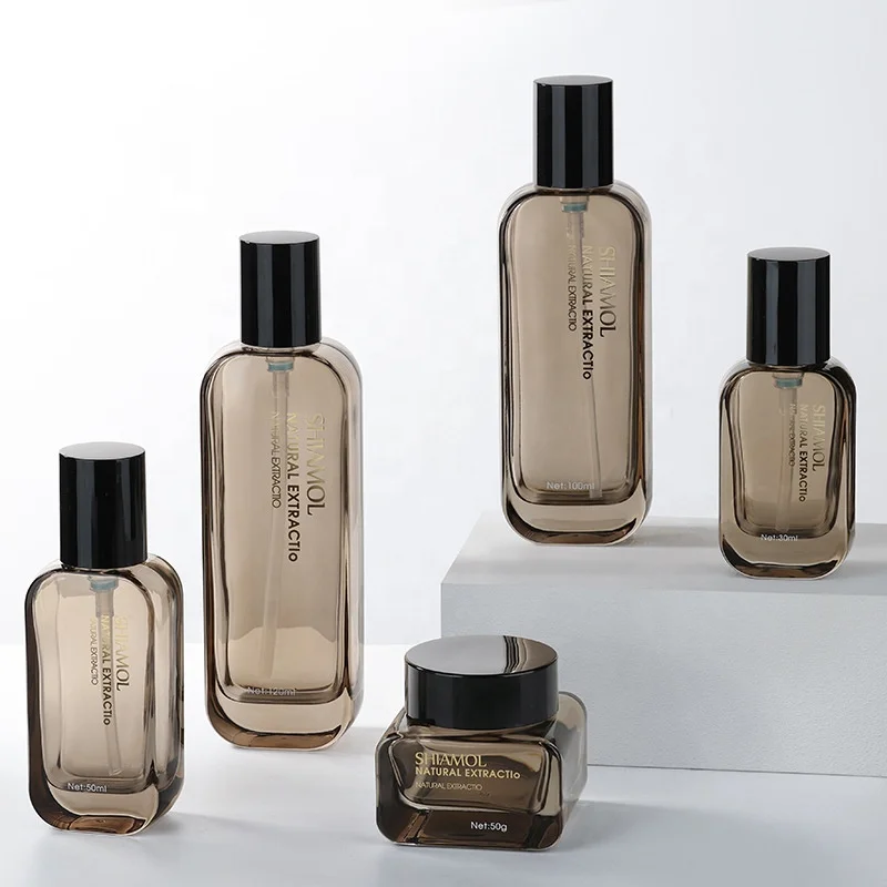 Wholesale clear black cosmetic packaging essence oil container square skincare set bottle glass 30g 50g face cream jar with lid