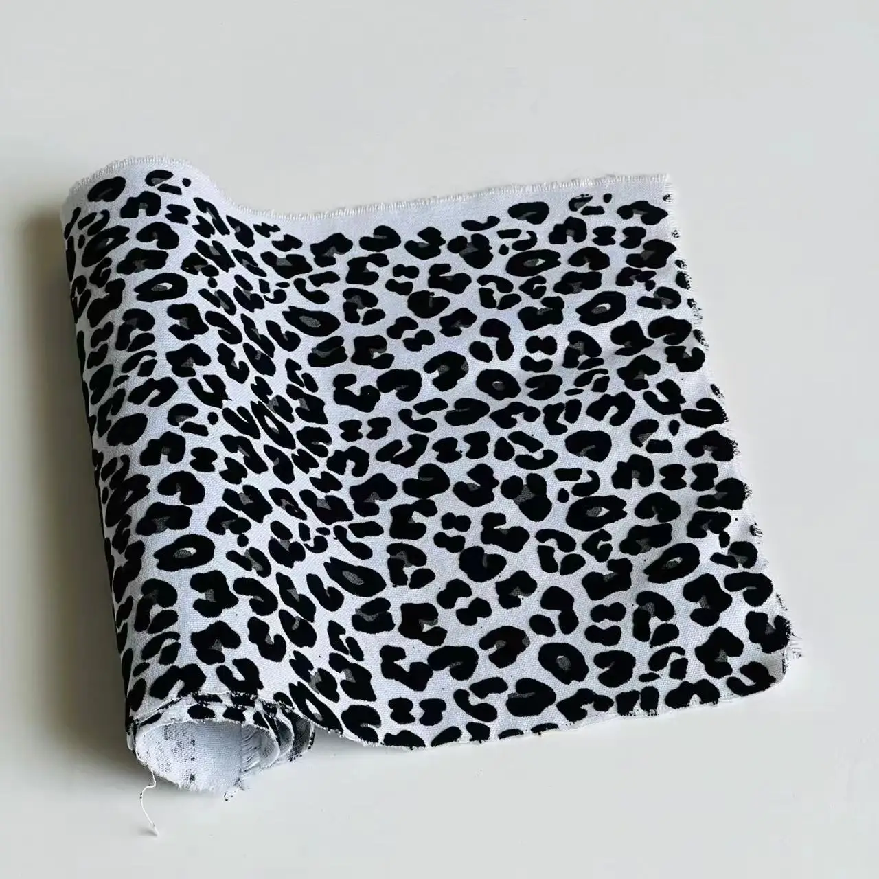 Fashionable leopard pattern flocked cotton canvas fabric for canvas bag drawstring bag