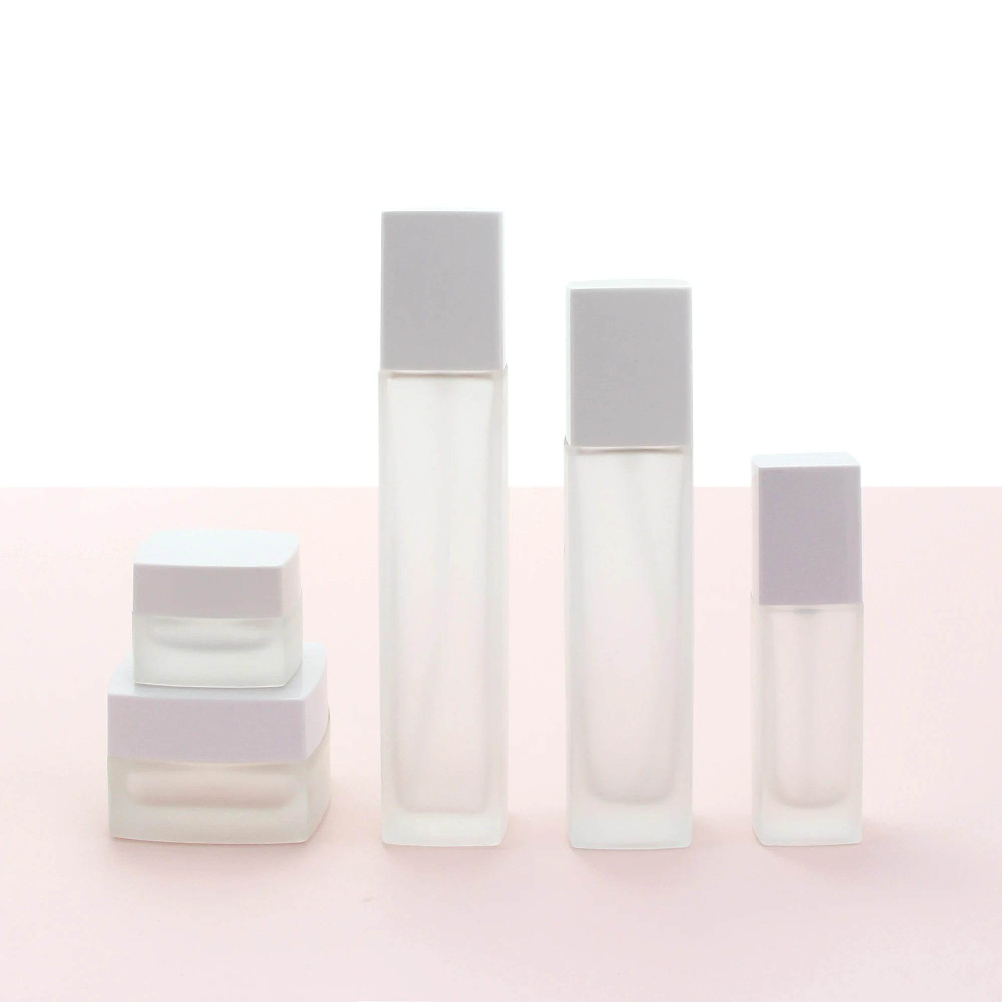 Wholesale cosmetic packaging set square matte pink empty body oil serum pump bottle and glass jars with lids
