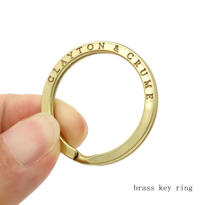 Jinzi factory new keychain item custom brand logo flat anti brass key ring