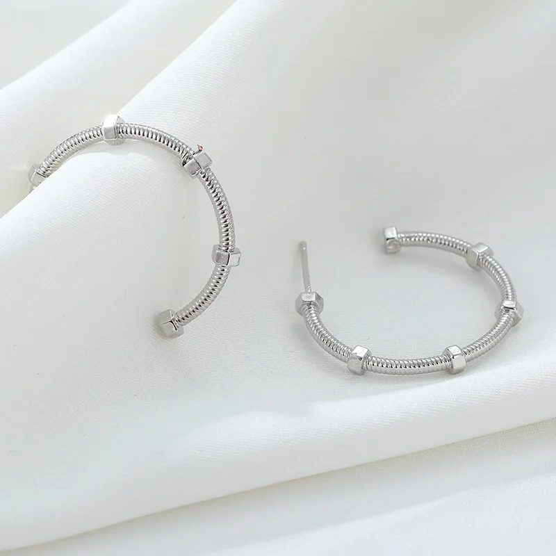 
unique round screw spike stud earrings in copper material Jewelry gold And silvery wholesale statement earrings 