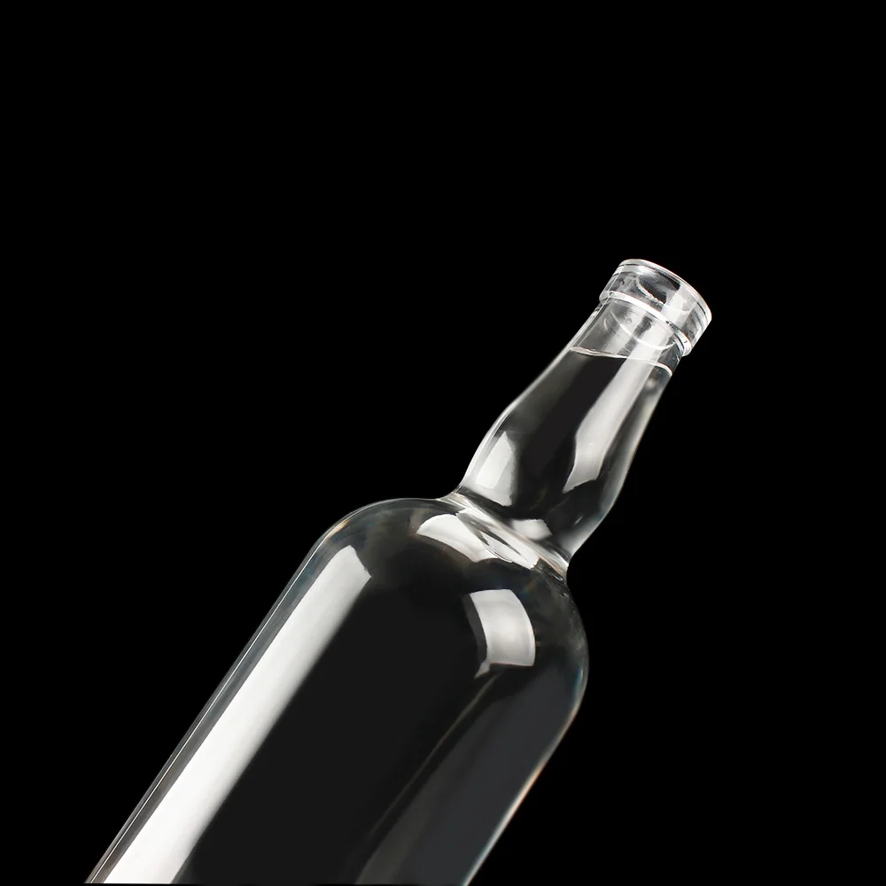 Customized logo printing round shape clear extra flint 750 ml spirits tequila vodka brandy rum gin liquor whisky glass bottle